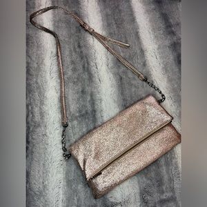 Sparkly rose, gold purse, or clutch with gunmetal in the chain